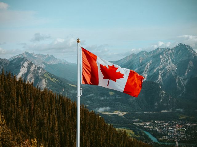 Canadian Flag in the Mountains